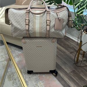 MK weekender bag and rolling monogram suitcase